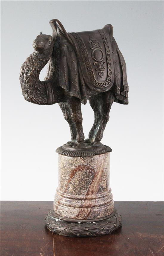 A bronze model of a caparisoned camel, 15in.